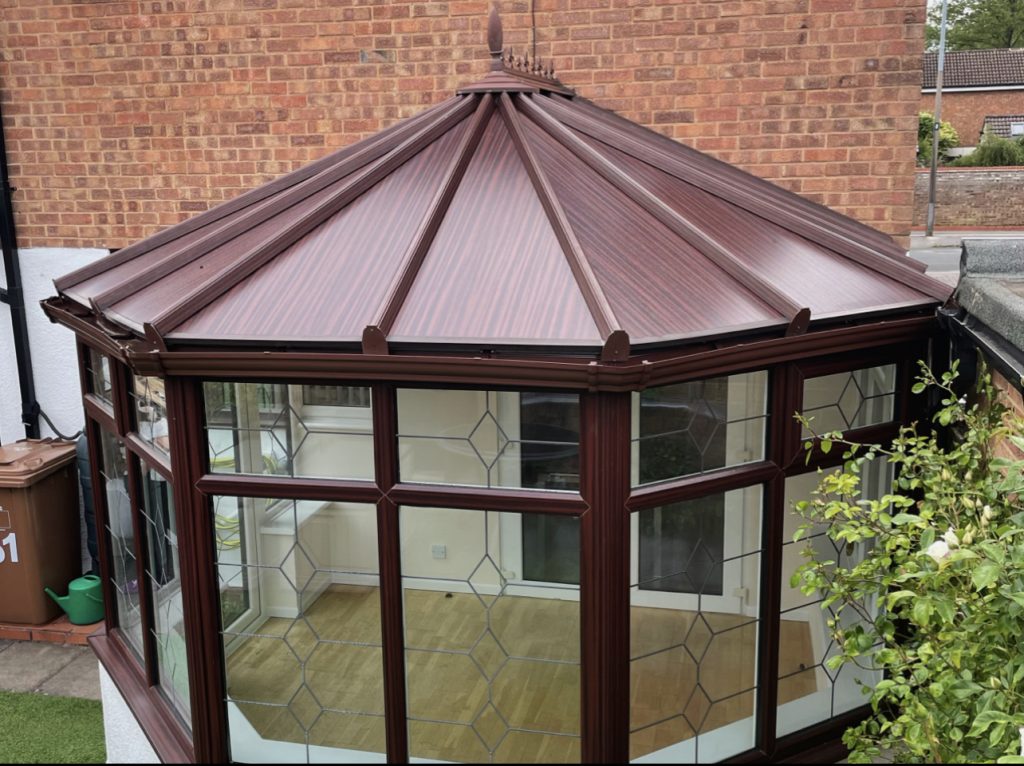 Modern conservatory with insulated roof.