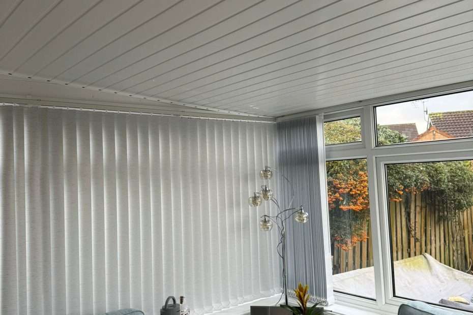 Professional installation of thermal insulation in a conservatory.